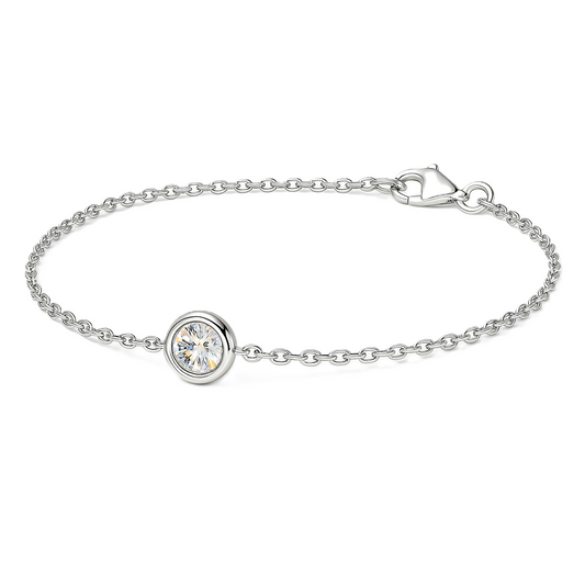Radiant Moissanite bracelet featuring a 3 mm round brilliant stone in white-gold-plated 925 silver. Elegant brilliance for daily wear. Available at BSI Jewelry.