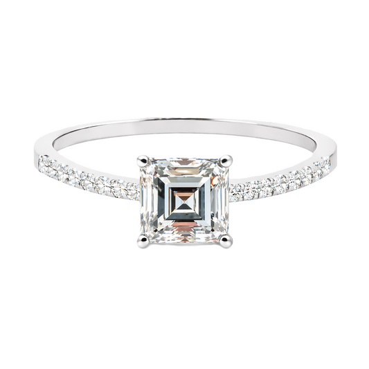 Moissanite carré ring with a 6 mm square-cut stone, accented by moissanite in white gold-plated 925 silver. Modern and refined. Available now at BSI Jewelry.
