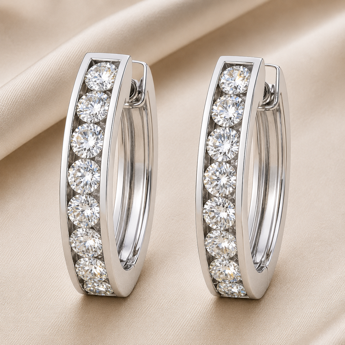 2.5 mm moissanite channel set huggies earrings in white gold-plated 925 silver. Sleek, refined and hypoallergenic for daily wear. Available now at BSI Jewelry.