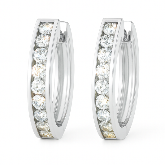 2 mm moissanite channel set huggies earrings in white gold-plated 925 silver. Sleek, refined and hypoallergenic for daily wear. Available now at BSI Jewelry.