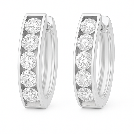 3.5 mm moissanite channel set huggies earring in white gold-plated 925 silver. Sleek, refined and hypoallergenic for daily wear. Available now at BSI Jewelry.