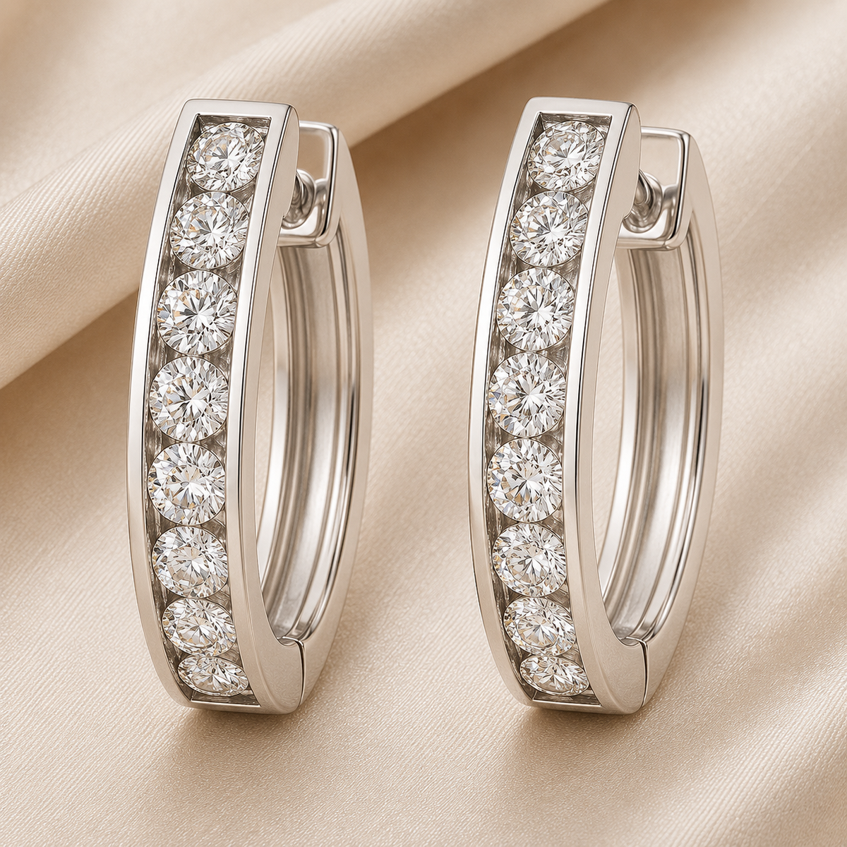3 mm moissanite channel set huggies earrings in white gold-plated 925 silver. Sleek, refined and hypoallergenic for daily wear. Available now at BSI Jewelry.