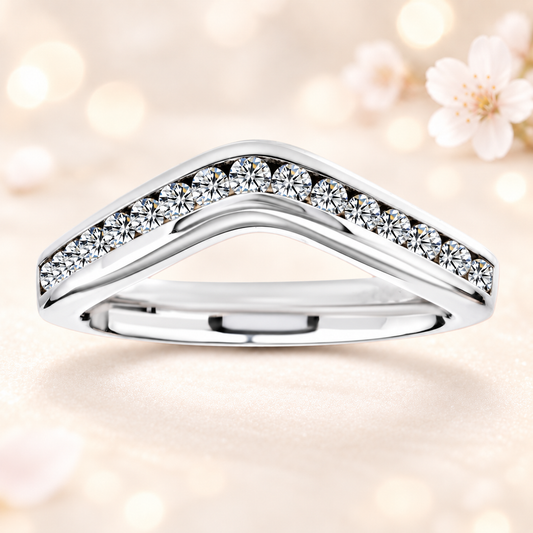 A luminous chevron wedding band with 13 Moissanite stones totaling 0.70 carat, crafted in white-gold-plated 925 silver for radiant sparkle and timeless elegance