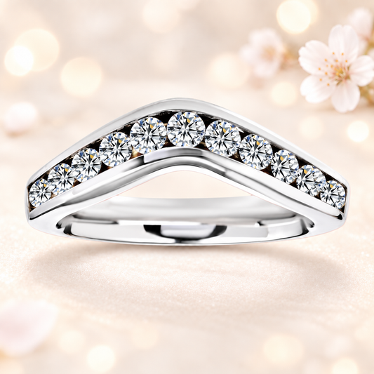 A bold chevron wedding band with 11 Moissanite stones totaling 1.00 carat, crafted in white-gold-plated 925 silver for radiant sparkle and timeless elegance.