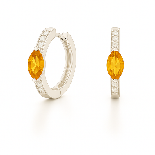 Citrine and Moissanite marquise huggie earrings in white gold-plated 925 silver with 6×3 mm stones. Hypoallergenic and safe to wear. Available at BSI Jewelry.