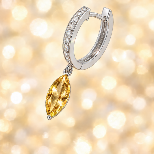 Citrine marquise huggie earrings with 12×6 mm drops, crafted in white gold-plated 925 silver and accented with Moissanite. Available now at BSI Jewelry.