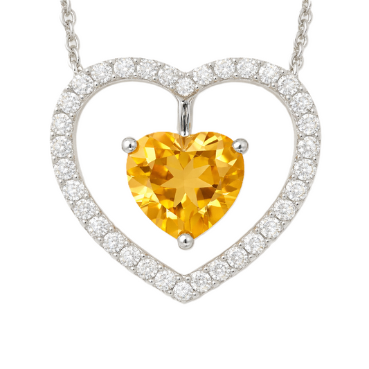 Moissanite and citrine necklace with a 6 mm heart-cut gemstone in white gold-plated 925 silver. Warm and elegant. Available now at BSI Jewelry.