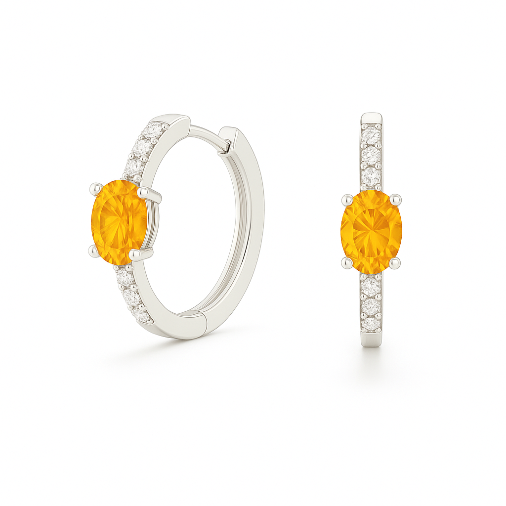 Elegant oval-cut citrine huggie earrings in white gold-plated 925 silver with sparkling Moissanite accents for a warm, golden glow. Available now at BSI Jewelry.