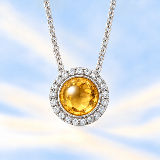 Moissanite and citrine pendant with a 6 mm cabochon gemstone in white gold-plated 925 silver. Warm and elegant. Available now at BSI Jewelry.