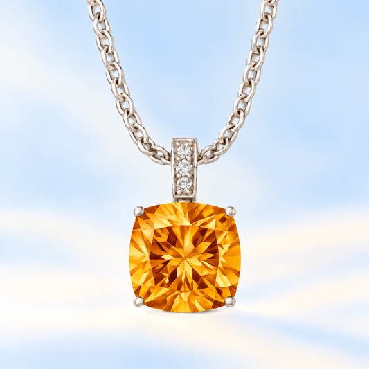 Moissanite and citrine pendant with a 6 mm cushion-cut gemstone in white gold-plated 925 silver. Warm and elegant. Available now at BSI Jewelry.
