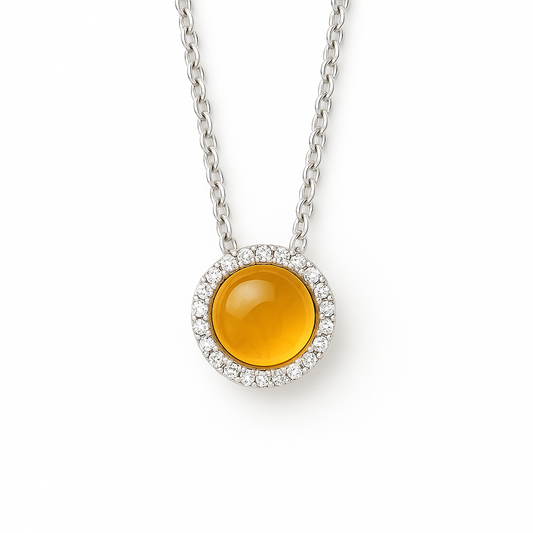 Bright citrine cabochon pendant accented with Moissanite in 925 silver. 6mm gem, hypoallergenic, and radiant elegance. Available now at BSI Jewelry.