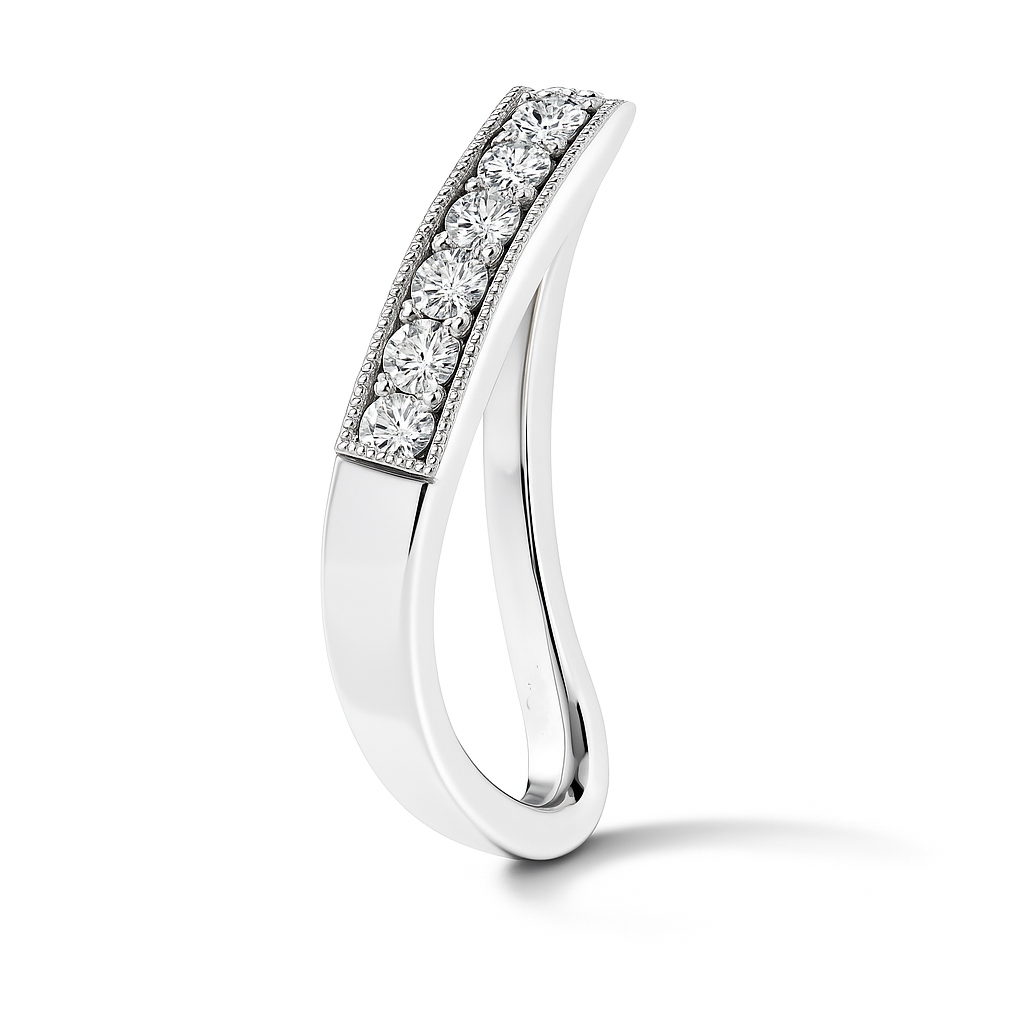Elegant Moissanite curved pavé wedding band in 925 silver. Finely crafted for stacking or timeless daily elegance. Hypoallergenic. Available Now at BSI Jewelry.