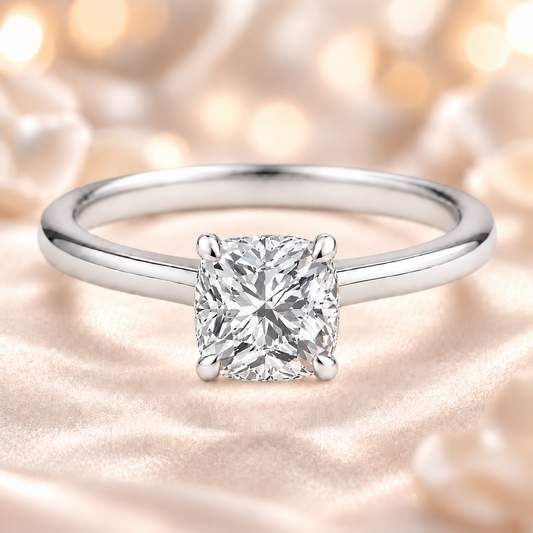 8 mm cushion-cut Moissanite solitaire in white gold-plated 925 silver with palladium-added alloy. Elegant, bold, and hypoallergenic. Available now at BSI Jewelry.