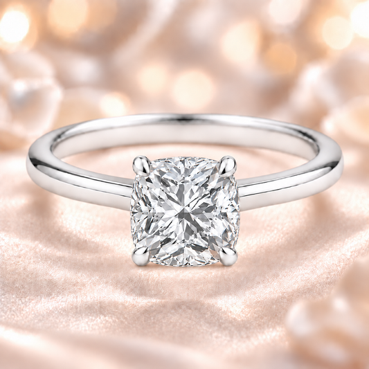 9 mm cushion-cut Moissanite solitaire in white gold-plated 925 silver with palladium-added alloy. Elegant, bold, and hypoallergenic. Available now at BSI Jewelry.