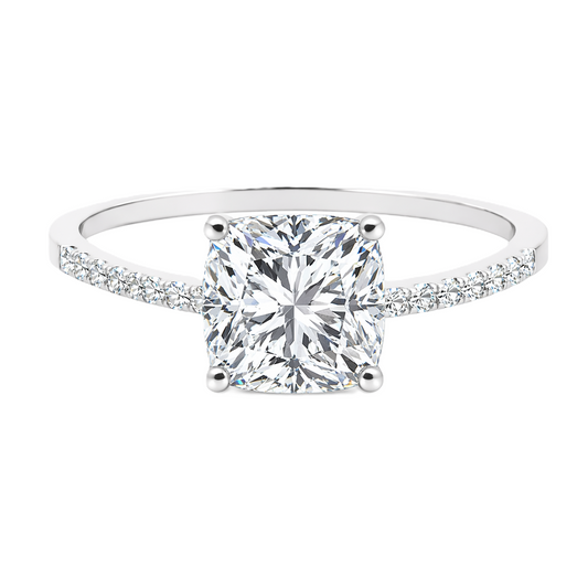 Moissanite cushion ring with a 6 mm cushion-cut, accented by moissanite in white gold-plated 925 silver. Elegant and timeless. Available now at BSI Jewelry.