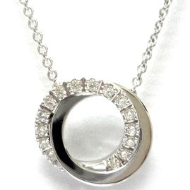 Modern Moissanite double circle necklace in 925 silver, featuring half pavé brilliance and half polished finish. A sleek design. Available now at BSI Jewelry.