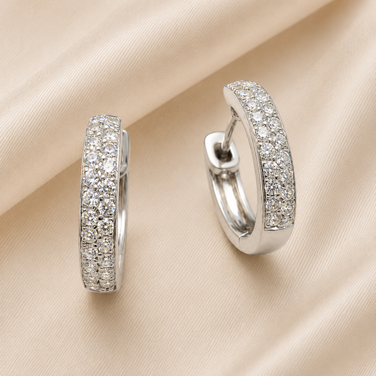 Moissanite double row huggie earrings in 925 silver, pavé-set for radiant brilliance. A versatile design that adds sparkle to any style. Now at BSI Jewelry.