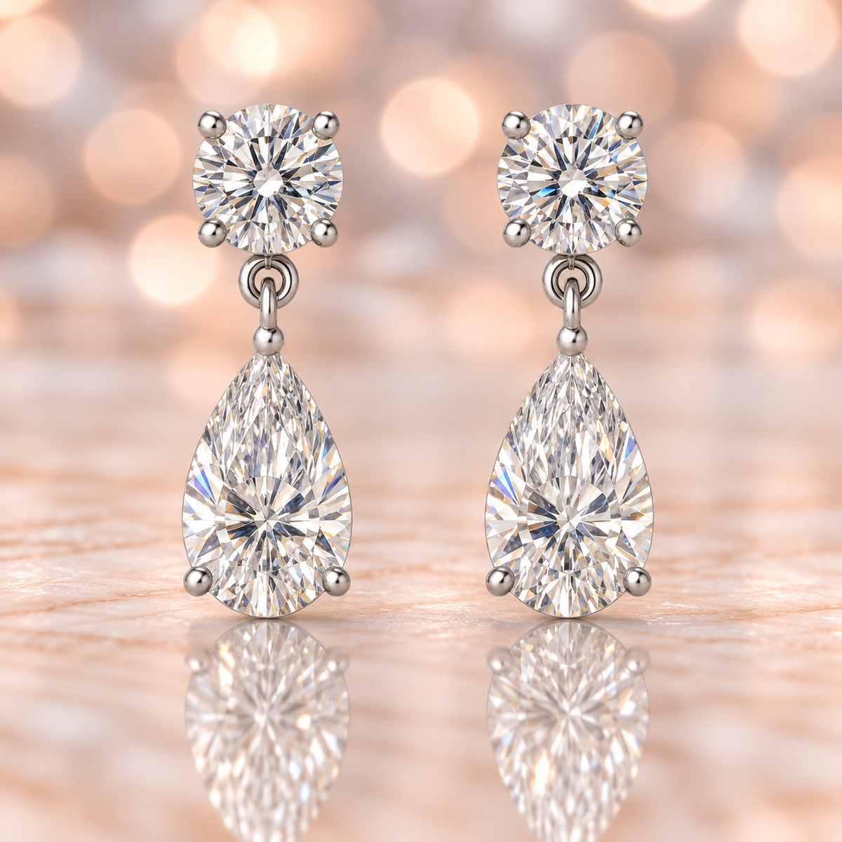 Moissanite Stud Earrings featuring round brilliant and pear cuts, crafted in white gold-plated 925 silver. Graceful and hypoallergenic. Available at BSI Jewelry.