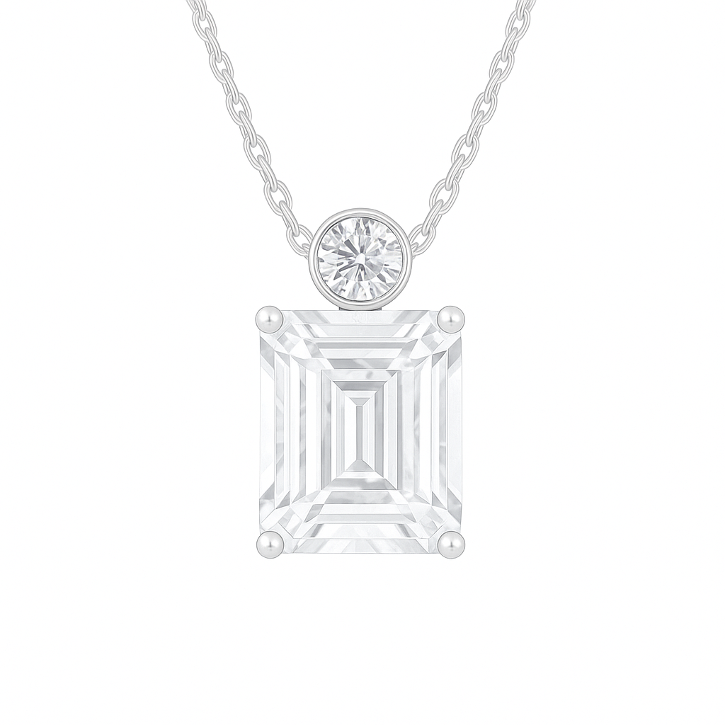 Moissanite emerald-cut pendant with 7×5 mm stone, crafted in white gold-plated 925 silver. Elegant sparkle and hypoallergenic comfort. Available at BSI Jewelry.