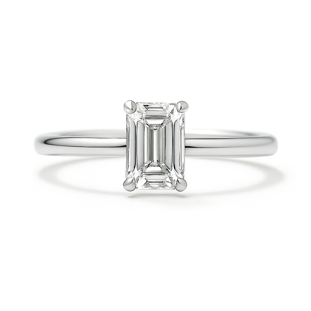 A 5×3 mm emerald-cut Moissanite solitaire in white gold-plated 925 silver with palladium alloy—brilliant, elegant, and hypoallergenic. Available at BSI Jewelry.