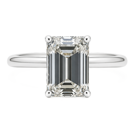 A 9×7 mm emerald-cut Moissanite solitaire in white gold-plated 925 silver with palladium alloy brilliant, elegant, and hypoallergenic. Available at BSI Jewelry.