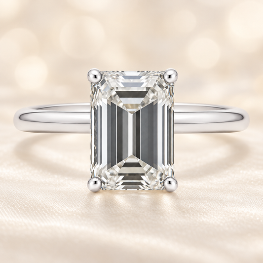 A 9×7 mm emerald-cut Moissanite solitaire in white gold-plated 925 silver with palladium alloy brilliant, elegant, and hypoallergenic. Available at BSI Jewelry.