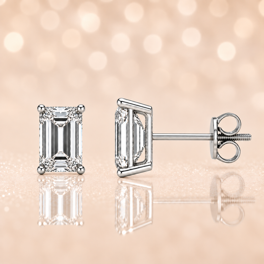 Moissanite Emerald-Cut Stud Earrings crafted in white gold-plated 925 silver with palladium-added alloy. Elegant and hypoallergenic. Available at BSI Jewelry.