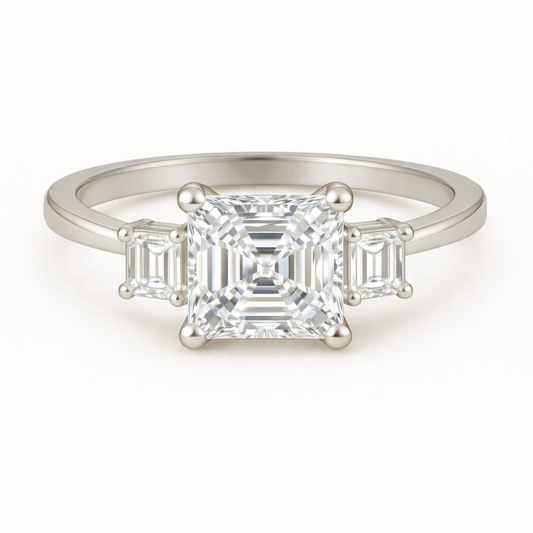 Moissanite engagement ring with 6 mm Asscher and emerald-cut accents in white gold-plated 925 silver. Elegant and hypoallergenic. Available now at BSI Jewelry.