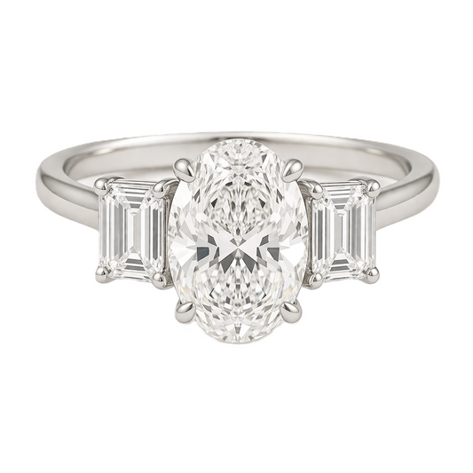 Moissanite engagement ring with 7×5 mm oval and emerald-cut accents in white gold-plated 925 silver. Elegant and hypoallergenic. Available now at BSI Jewelry.