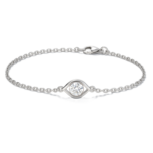 Elegant Moissanite eye bracelet with 3 mm round brilliant stone, crafted in white-gold-plated 925 silver. Timeless elegance. Available now at BSI Jewelry.
