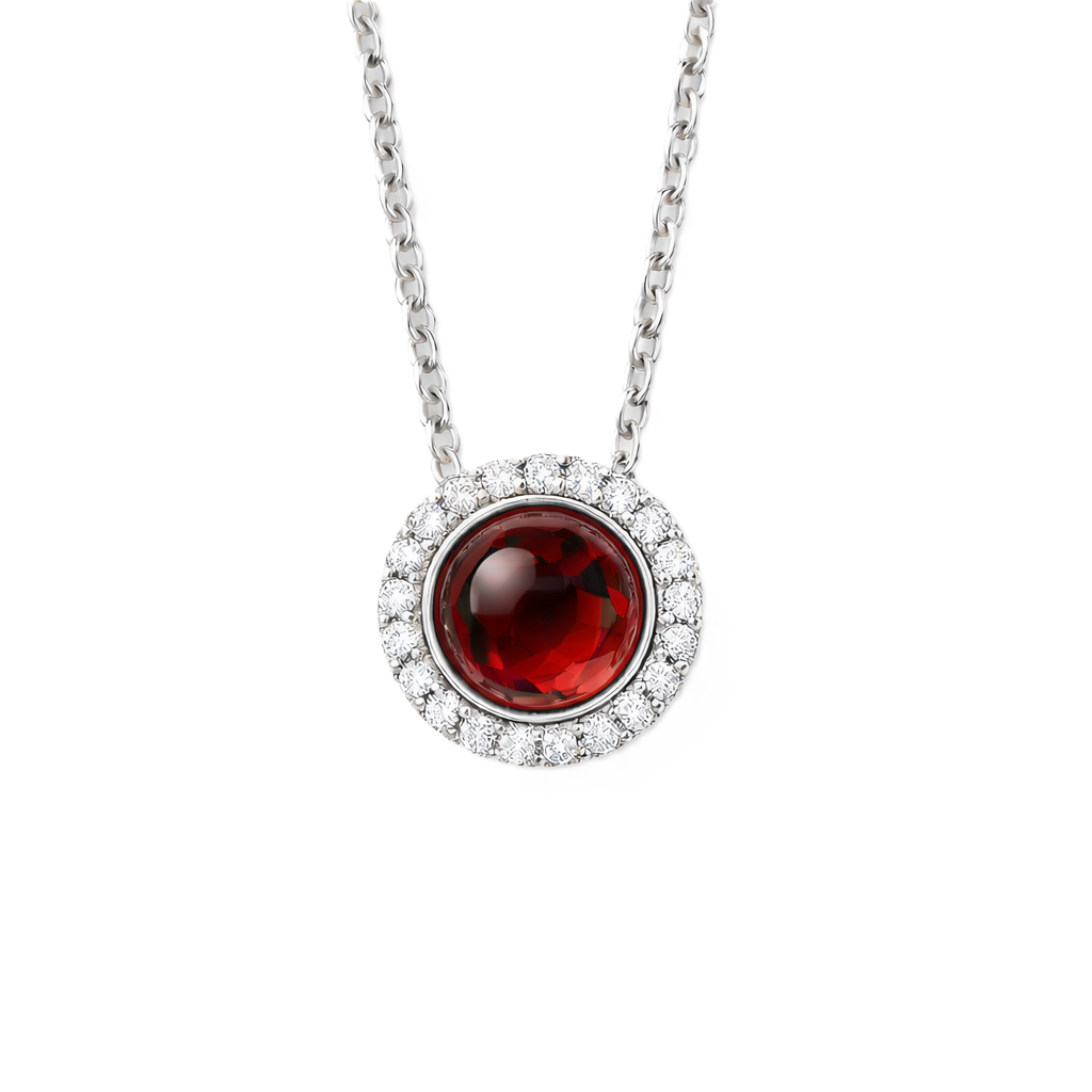 Moissanite and garnet pendant with a 6 mm cabochon gemstone in white gold-plated 925 silver. Elegant and expressive. Available now at BSI Jewelry.