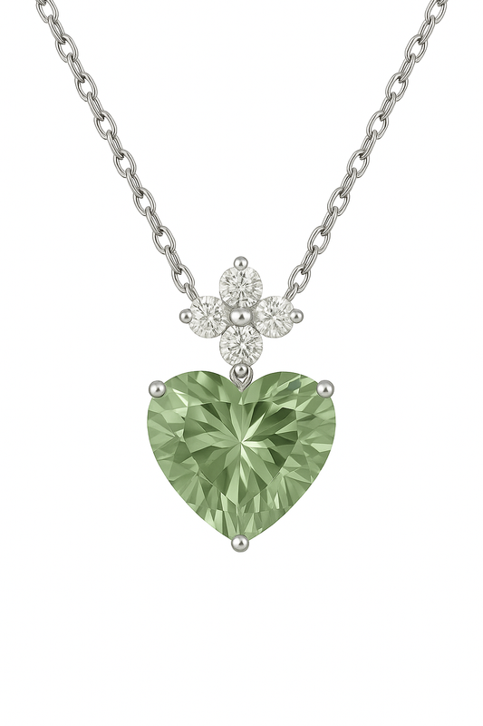 Delicate 7mm heart-cut Green Amethyst necklace with Moissanite accents in white-gold-plated 925 silver. Refined sparkle with serene beauty. Now at BSI Jewelry.