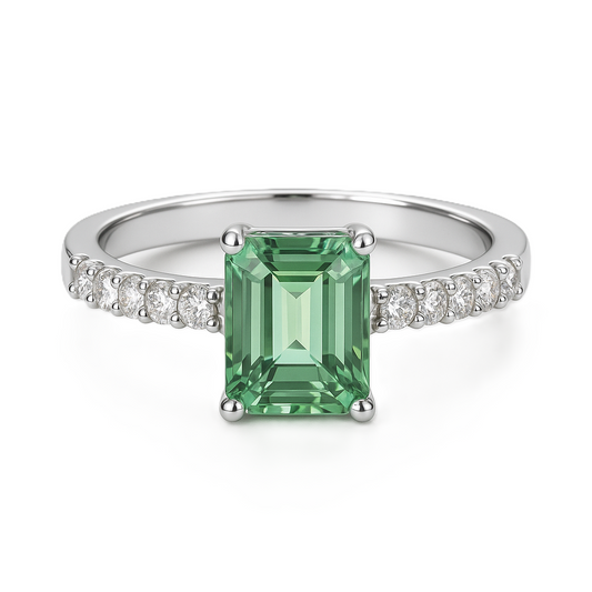 7×5mm emerald-cut Green Sapphire ring with Moissanite accents in white-gold-plated 925 silver. Elegant, luminous, and hypoallergenic. Available at BSI Jewelry.