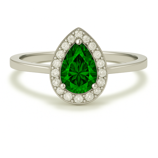 7×5 mm pear-cut green sapphire ring with Moissanite accents in white-gold-plated 925 silver. Brilliant halo sparkle with refined elegance. Now at BSI Jewelry.
