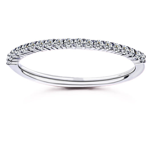 Elegant 0.10 carat Moissanite half-eternity wedding band in white-gold-plated 925 silver, offering lasting brilliance and everyday comfort. Now at BSI Jewelry.