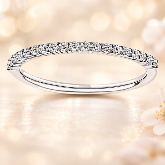Elegant 0.10 carat Moissanite half-eternity wedding band in white-gold-plated 925 silver, offering lasting brilliance and everyday comfort. Now at BSI Jewelry.