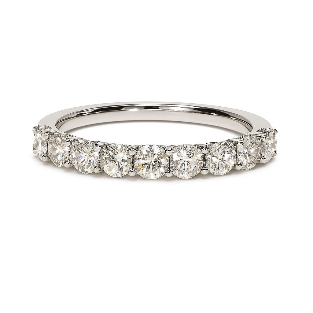 Elegant 1.00 carat Moissanite half-eternity band in white-gold-plated 925 silver. Radiant sparkle, timeless beauty, and lasting comfort. Available at BSI Jewelry.