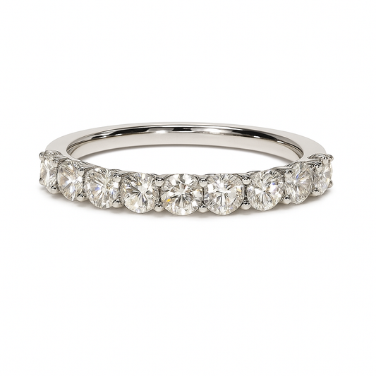 Elegant 1.00 carat Moissanite half-eternity band in white-gold-plated 925 silver. Radiant sparkle, timeless beauty, and lasting comfort. Available at BSI Jewelry.