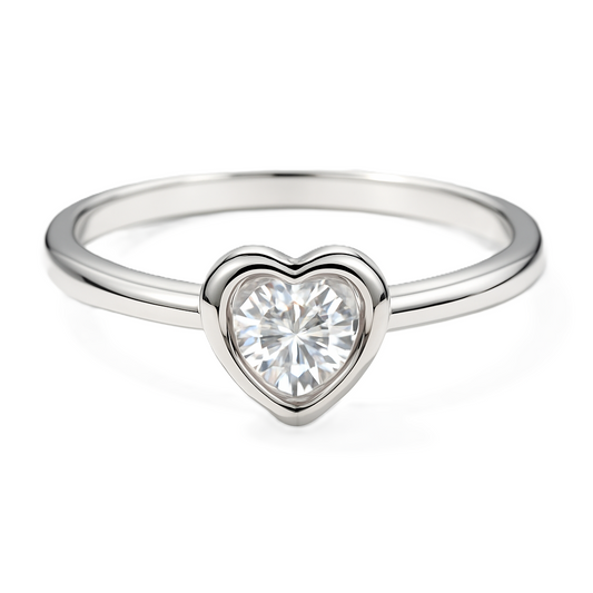Moissanite heart solitaire ring with 3 mm round center stone, crafted in white-gold-plated 925 silver. Radiant sparkle and elegance. Available at BSI Jewelry.