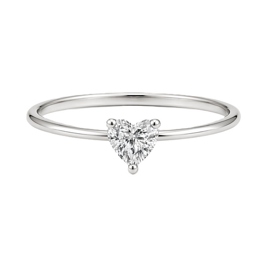 Dainty 5mm heart-cut Moissanite solitaire in white gold-plated 925 silver with palladium-added alloy. Elegant, radiant, and hypoallergenic. Now at BSI Jewelry.
