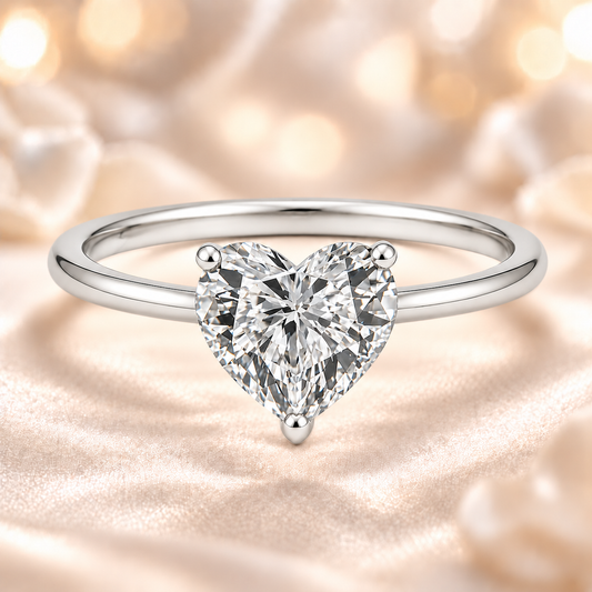 9mm heart-cut Moissanite solitaire in white gold-plated 925 silver with palladium-added alloy. Brilliant, bold, and hypoallergenic. Available now at BSI Jewelry.