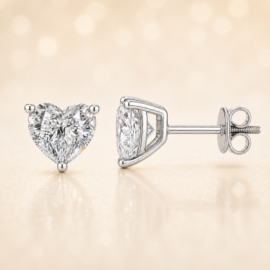 Moissanite heart stud earrings in 5 mm, crafted in white gold-plated 925 silver with screw-back posts. Safe for sensitive skin. Available now at BSI Jewelry.