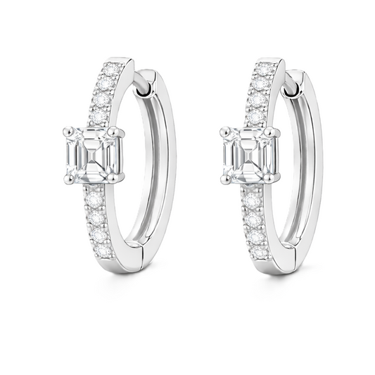 Moissanite huggie earrings, 5 mm Asscher cut in white gold plated 925 silver. Elegant pavé hoop design with brilliant sparkle. Available now at BSI Jewelry.