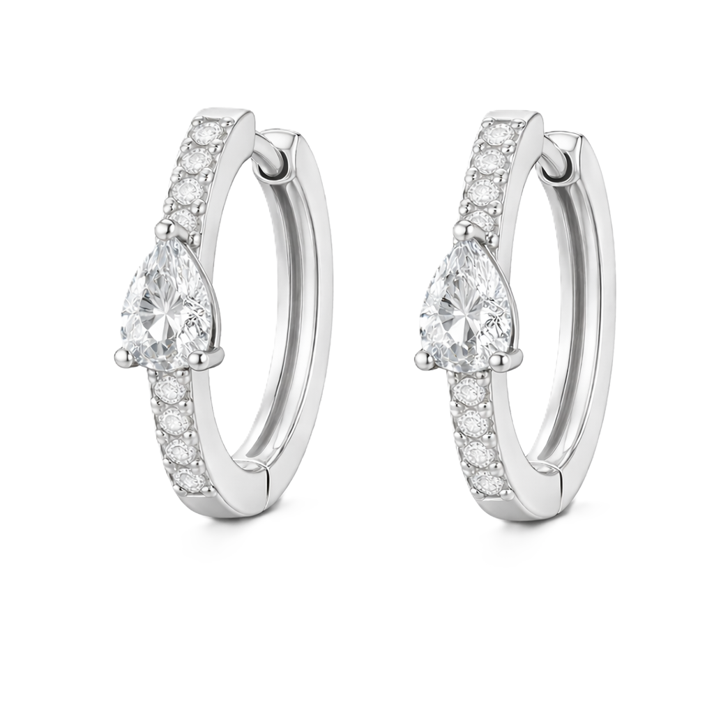 Moissanite huggie earrings, 5×3 mm pear cut in white gold plated 925 silver. Elegant pavé hoop design with brilliant sparkle. Available now at BSI Jewelry.