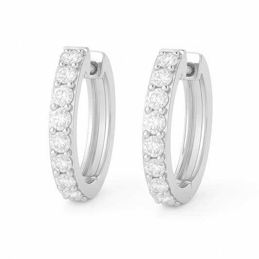 1.5 mm round Moissanite huggies in white gold-plated 925 silver. Fine sparkle, lightweight, hypoallergenic and safe for daily wear. Available now at BSI Jewelry.