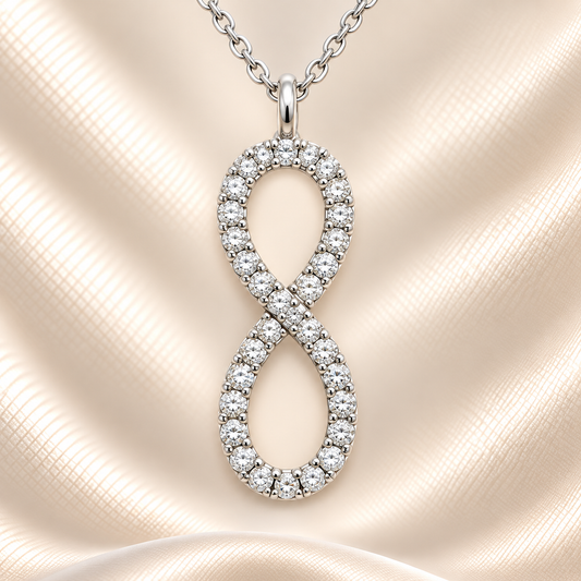 Timeless Moissanite infinity pendant in 925 silver with pavé sparkle. Includes chain, white gold-plated, hypoallergenic, and elegant. Available at BSI Jewelry.