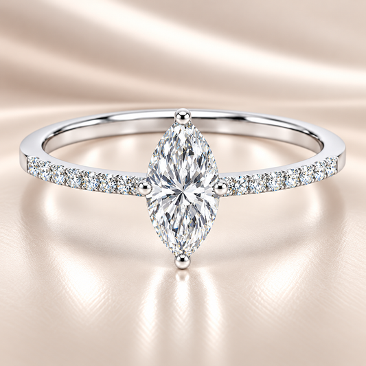 Moissanite marquise ring with an 8×4 mm marquise-cut, accented by moissanite in white gold-plated 925 silver. Elegant and refined. Available now at BSI Jewelry.
