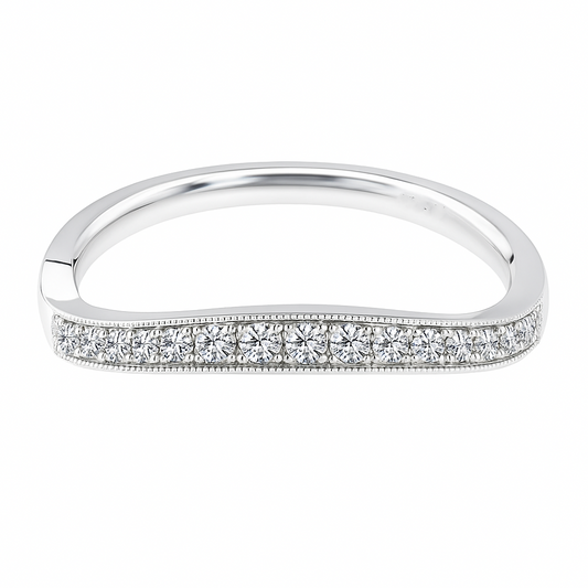 Vintage-inspired Moissanite curved wedding band in 925 silver with milgrain detail. Finely crafted, hypoallergenic, and timelessly elegant. Now at BSI Jewelry.