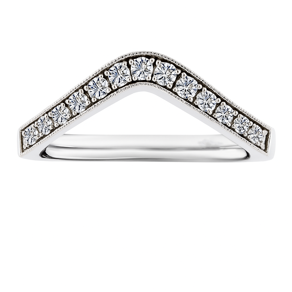 Vintage-inspired Moissanite V-shaped wedding band in 925 silver with milgrain detail. Channel-set brilliance and timeless elegance. Available at BSI Jewelry.