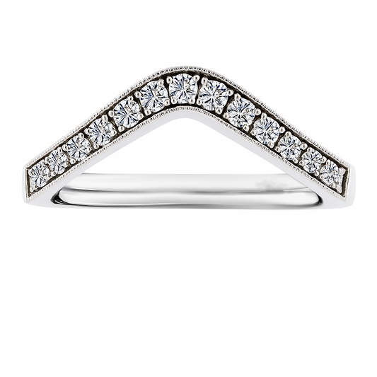 Vintage-inspired Moissanite V-shaped wedding band in 925 silver with milgrain detail. Channel-set brilliance and timeless elegance. Available at BSI Jewelry.